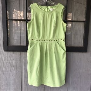 Sandra Darren dress, lime green with brass studs across waist, pockets on front
